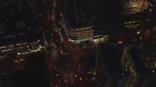 High Angle View of Traffic at Crossroad in Urban Borough at Night