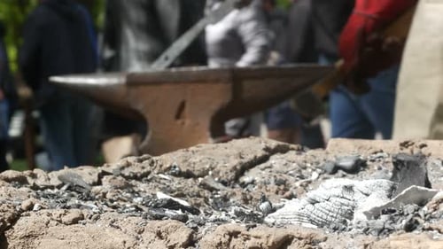Blacksmithing with Anvil and Hammer in Open Air