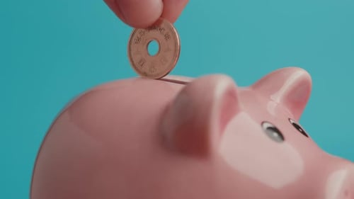 Saving Up Yen Coins In a Piggy Bank