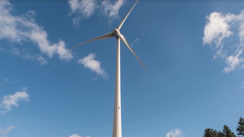 Wind Turbine Rotating on a Sunny Day