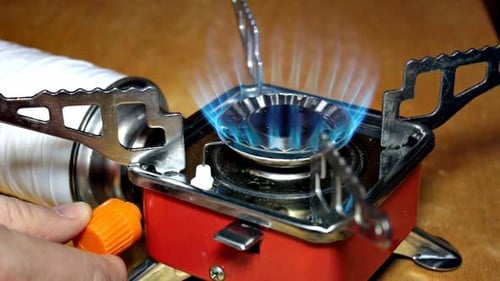 Portable Cooking Stove Ignites Blue Flame for Camping