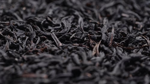 Close up shot of dark tea leaves