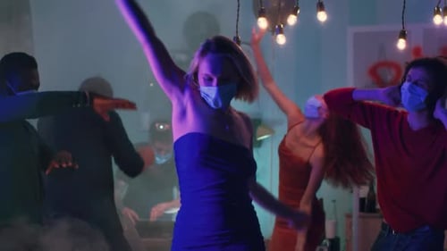 Friends Celebrate at Lively Indoor Masked Party