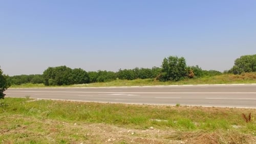 Truck Moving Along Country Road