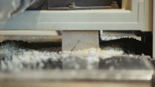 Wood Planing Machine Smoothing Lumber in Factory