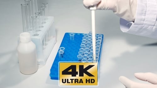 Medical Professional Preparing Samples in a Lab