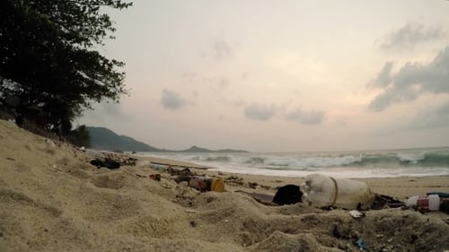 Waste On Beach Causes Environmental Pollution. Trash On Sand