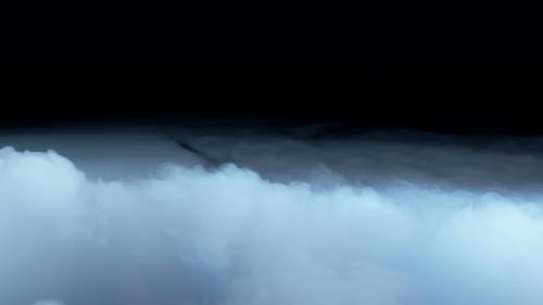 Abstract White Clouds Billowing Against Black Background