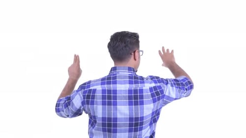 Rear View of Bearded Persian Hipster Man Touching Something
