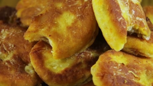 Pile of Delicious Golden Fried Pastries Close Up