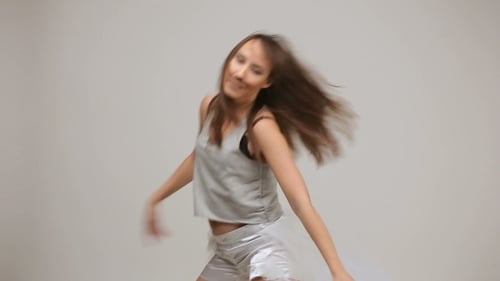Young Woman Dancing in Studio