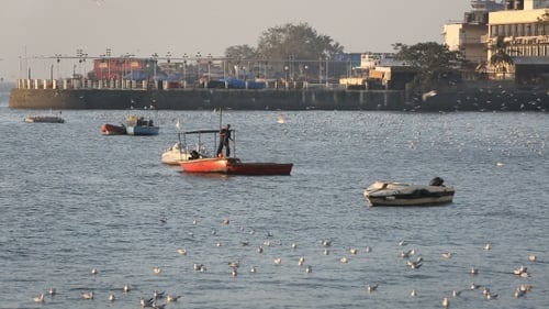 Tourist And Fisher Boats By The Harbour