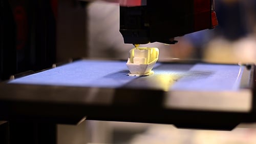 3D Printer Creating Geometric Object Close Up
