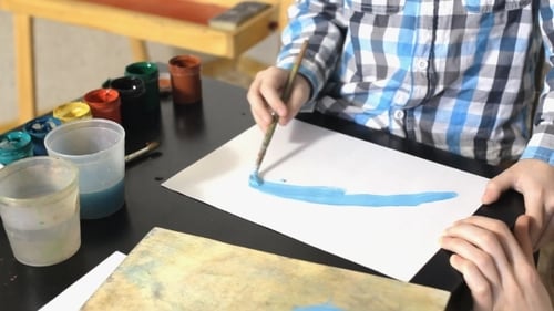 Mom And Kid Boy Painting Together At Home