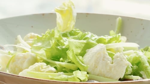 Fresh Salad with Lettuce, Cheese, and Grapes