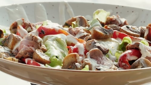 Fresh Salad with Beef and Mushrooms Rotating