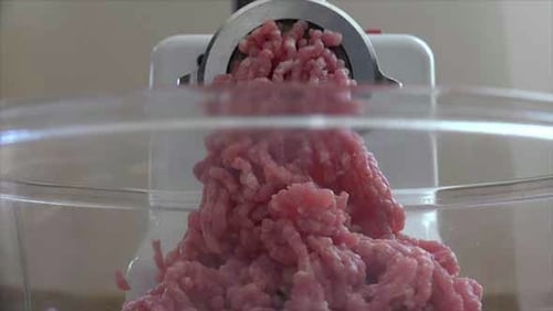 Meat Grinder Processing Ground Meat into Bowl