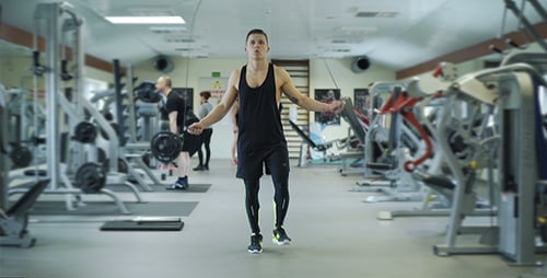 Athlete Exercising Using Jump Rope