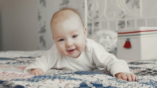 Baby Smiles And Laughs