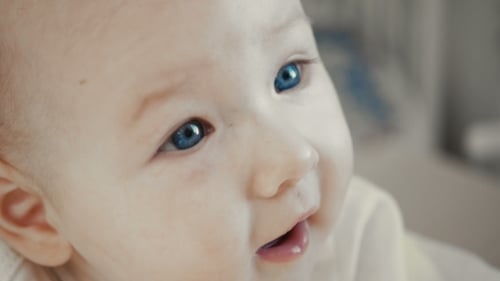 Baby Girl With Blue Eyes Face