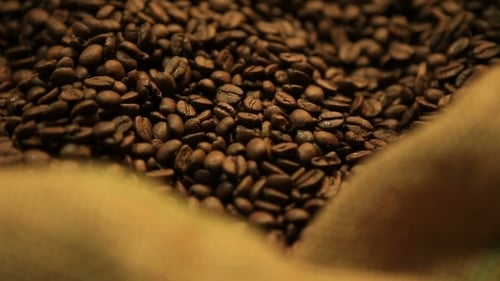 Grains Of The Roasted Coffee In The Bag.