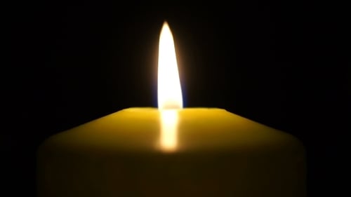 Footage Burning Candle Isolated On Black