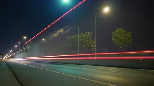 Night City Road with Car Light Streaks