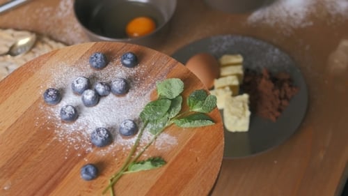 Blueberries On Wooden Background In Kitchen