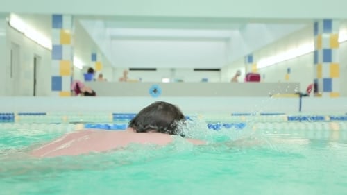 Man Swimming In The Pool