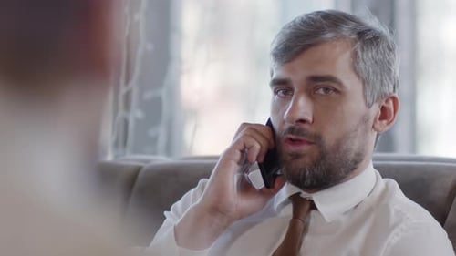 Businessman Having Telephone Conversation