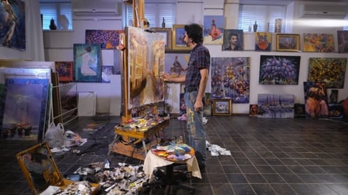 Artist Painting on Canvas in Studio Setting