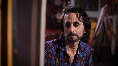 Adult Artist Painting in Art Studio