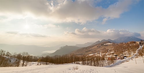 Snowy Mountains and Clouds in Winter