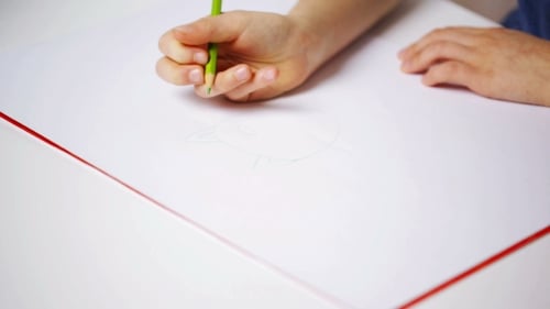 Hand Drawing on a White Piece of Paper