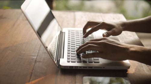 Typing on Laptop Keyboard in Bright Environment