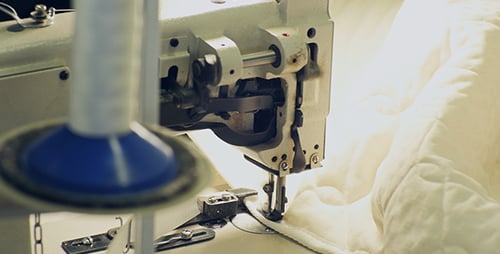 Sewing Machine Stitching Quilted Fabric