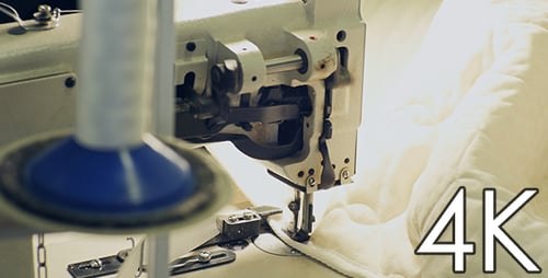 Sewing Machine Stitching White Quilted Fabric