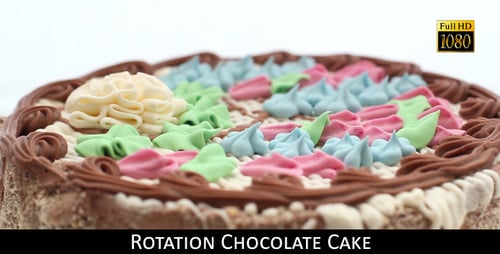 Delicious Iced Cake Slowly Rotating on a White Background