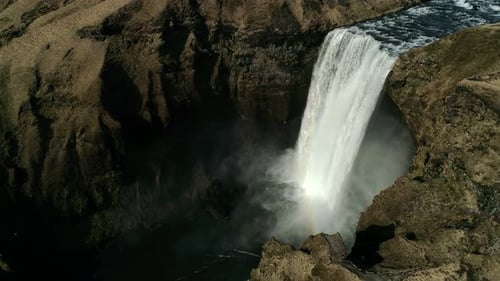 Aerial View of Powerful Waterfall in Nature