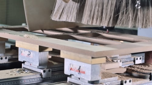 Milling Machine Cuts Wood Panel Frame