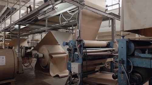 Large Industrial Paper Machine in Factory Setting