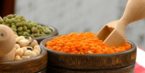 Vibrant Lentils and Beans in Wooden Bowls