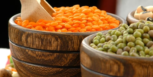 Assorted Colorful Lentils and Beans in Wooden Bowls