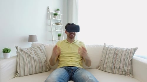 Young Man Wearing VR Headset Indoors