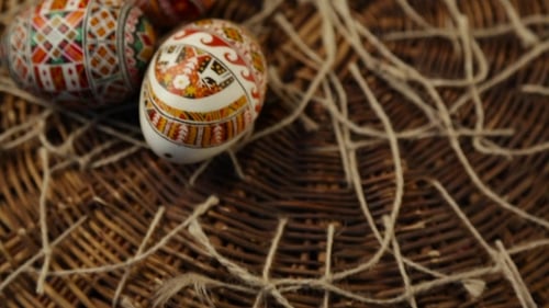 Decorated Easter Eggs in a Woven Basket