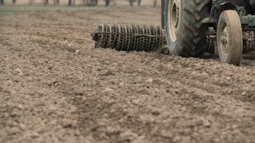 Agricultural Tractor Sowing And Cultivating Field