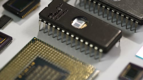 Computer Processor And Electronic Components On White Background