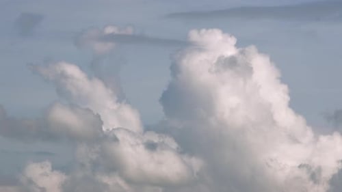 Fluffy cloud time lapse on a cloudy day.