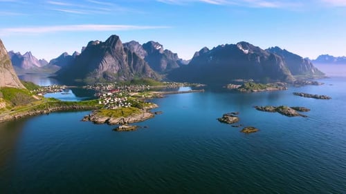 Breathtaking Aerial View of Coastal Village and Mountains