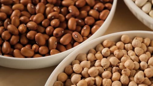 Variety of Beans in White Bowls Close Up